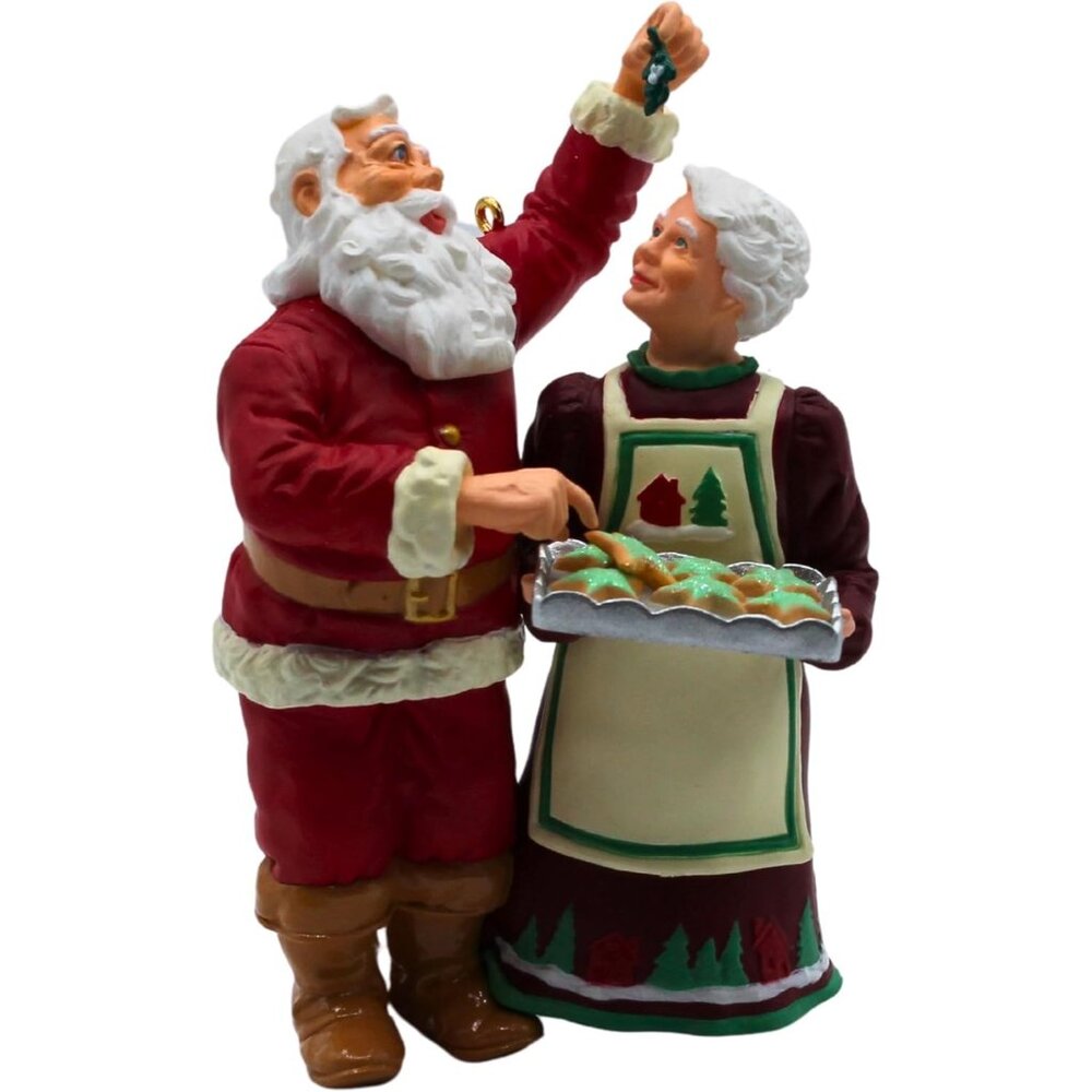 Hallmark Keepsake "Santa Sneaks A Sweet" Christmas Ornament  2001